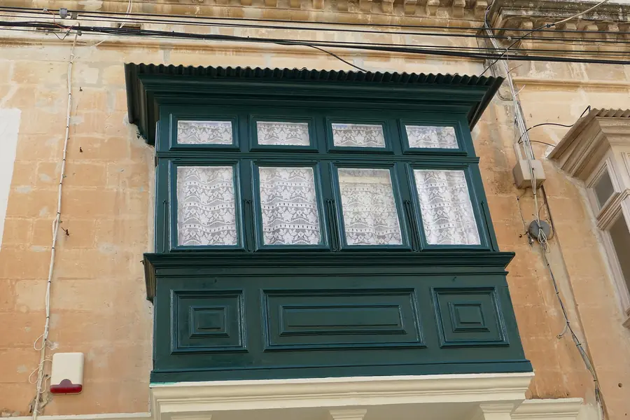A traditional green Maltese balcony
