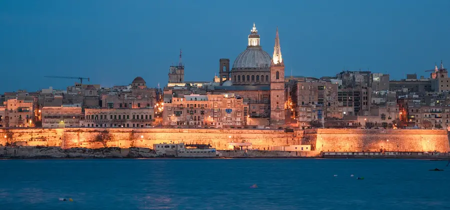 Maltese harbour city at dusk